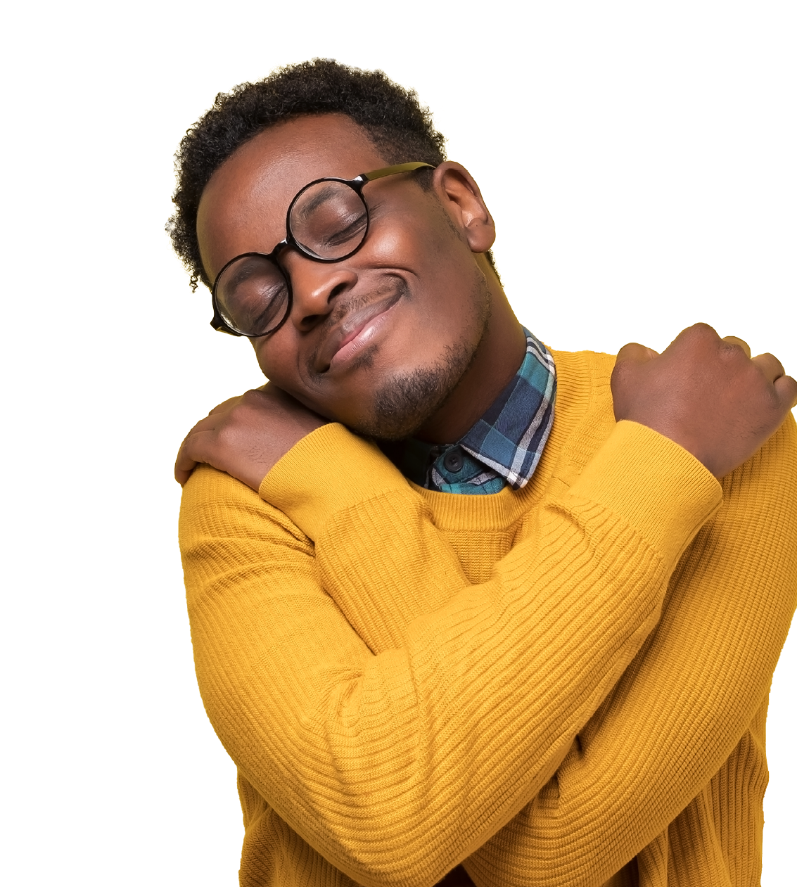 Pleased african american man in yellow clothes and glasses hugs himself, has high self esteem  Studio shot on colored wall 